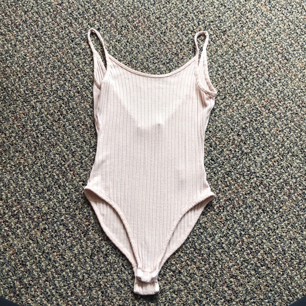 Tan body suit
